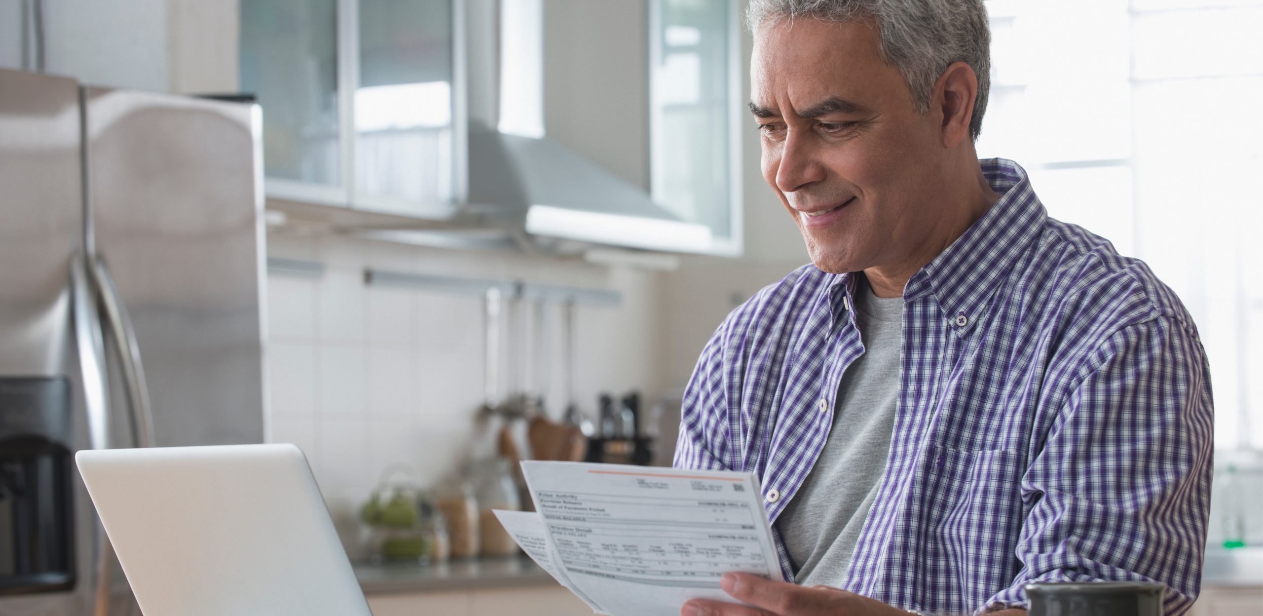 man looking at computer